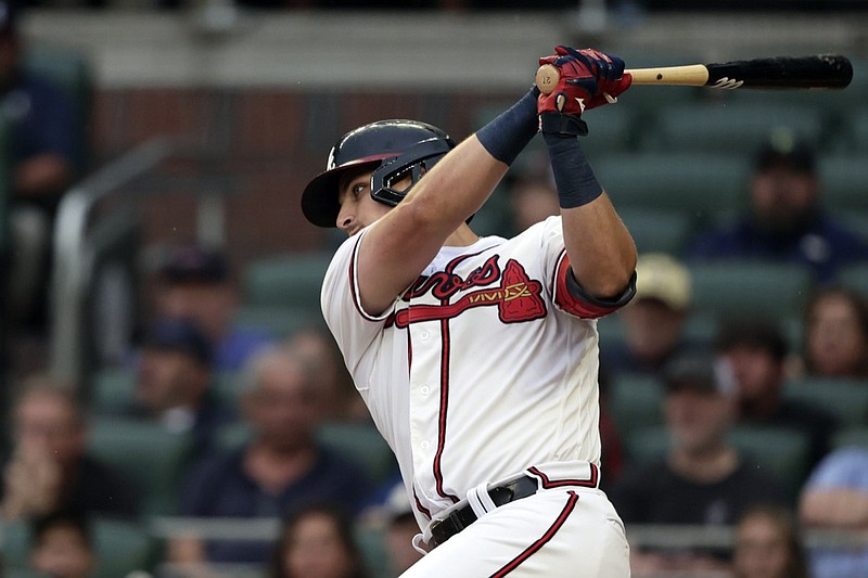 Atlanta Braves' Austin Riley at bat against the Arizona Diamondbacks during the first inning of a baseball game Saturday, July 30, 2022, in Atlanta. (AP Photo/Butch Dill)