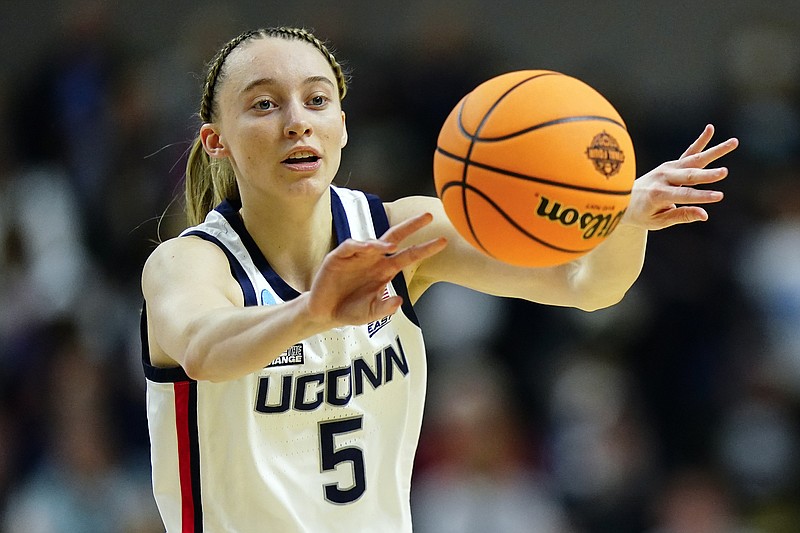 AP file photo by Frank Franklin II / Connecticut guard Paige Bueckers, who missed 19 games last season as a sophomore due to injury, will be sidelined for all of the 2022-23 season because of a torn ACL in her left knee.