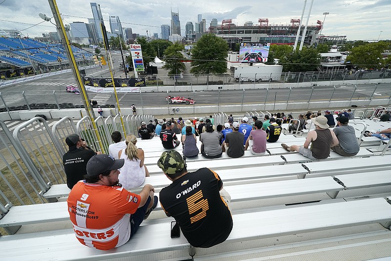 AP photo by Mark Humphrey / Fans watch a practice session Friday for Sunday's Music City Grand Prix, which will bring IndyCar racing to Nashville for the second year in a row.