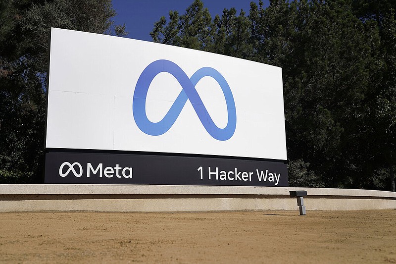 Facebook's Meta logo sign is seen at the company headquarters in Menlo Park, Calif., on, Oct. 28, 2021. Facebook owner Meta is quietly curtailing some of the safeguards designed to thwart voting misinformation or foreign interference in elections even as the U.S. Midterms approach. (AP Photo/Tony Avelar, File)