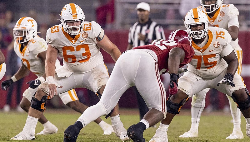 Tennessee Athletics photo / Tennessee center Cooper Mays (63) turns his attention to Alabama defensive lineman Justin Eboigbe during last season's game in Tuscaloosa.