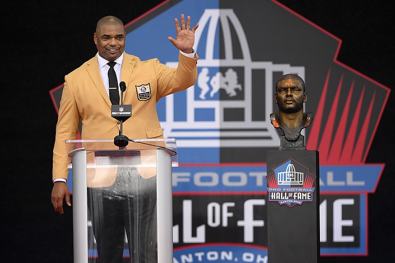 AP photo by David Richard / Former New England Patriots and Oakland Raiders star Richard Seymour waves as he ends his speech during his induction into the Pro Football Hall of Fame on Saturday in Canton, Ohio.