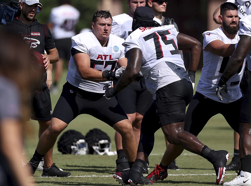 Atlanta Journal-Constitution photo by Jason Getz via AP / Atlanta Falcons offensive guards Justin Shaffer (75) and Chris Lindstrom drill Saturday during training camp in Flowery Branch, Ga.