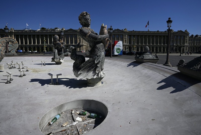 The fountains of Concorde plaza are empty in Paris, France, as Europe is under an extreme heat wave on Wednesday, Aug. 3, 2022. (AP Photo/Francois Mori)


