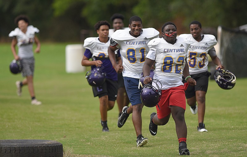 Staff photo by Matt Hamilton / Central football players take the field for a preseason practice on July 25 in Harrison. The Purple Pounders, who shared the Region 3-4A title last season with East Hamilton and Red Bank, return eight starters on offense and eight on defense.