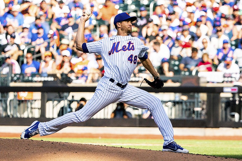 AP photo by Julia Nikhinson / The New York Mets' Jacob deGrom carried a perfect game into the sixth inning of Sunday's home win against the Atlanta Braves.