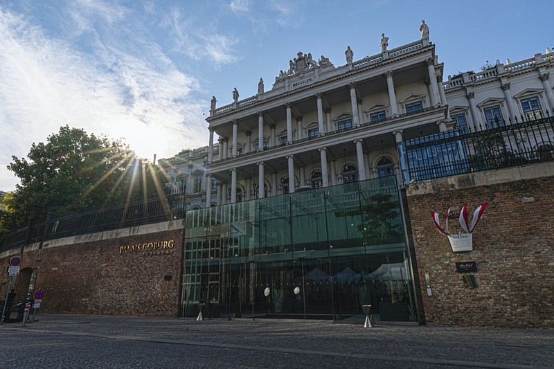 FILE - The sun sets behind the Palais Coburg where closed-door nuclear talks take place in Vienna, Austria, Aug. 5, 2022. Talks to revive Tehran's tattered nuclear accord with world powers in Vienna ended Monday, Aug. 8, 2022, as the parties closed a final text and the Iranian negotiator prepared to return to his capital, diplomats said. (AP Photo/Florian Schroetter, File)