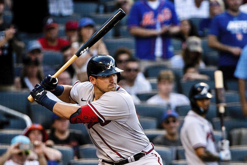 Atlanta Braves' Austin Riley strikes out swinging during the fourth inning of a baseball game against the New York Mets, Sunday, Aug. 7, 2022, in New York. The Mets won 5-2. (AP Photo/Julia Nikhinson)