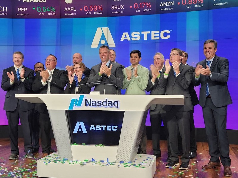 Contributed Photo by Astec Industries / Barry Ruffalo, the CEO of Astec Industries, rings the bell Tuesday to start trading on the Nasdaq exchange. Chattanooga-based Astec Industries celebrated its 50th anniversary Tuesday. The company has been traded on a Nasdaq stock since 1986.