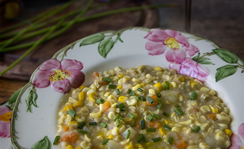 Corn chowder made by Bethany Jean Clement with an assistant from Seattle chef Kristi Brown. / Ellen M. Banner/Seattle TImes/TNS