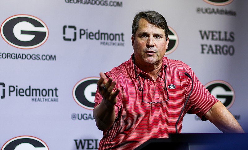 Georgia photo by Tony Walsh / Georgia co-defensive coordinator Will Muschamp speaks to reporters Tuesday during a news conference in Athens.