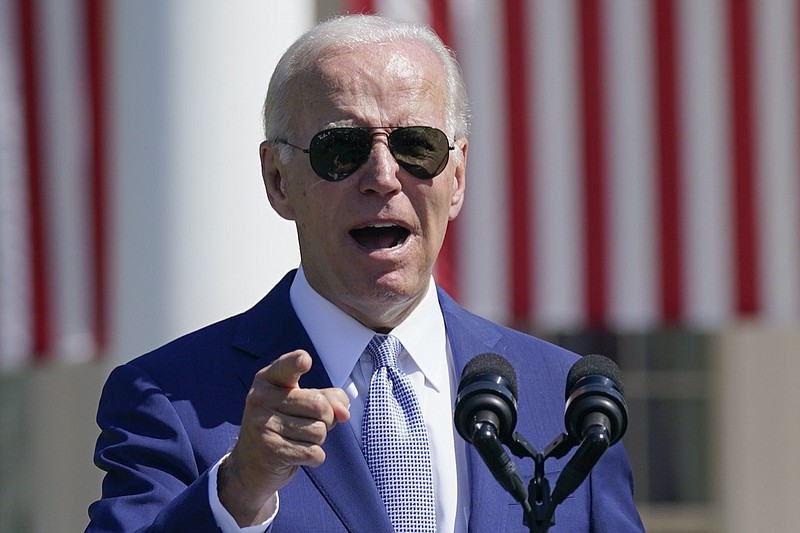 President Joe Biden speaks before signing the "CHIPS and Science Act of 2022" during a ceremony on the South Lawn of the White House, Tuesday, Aug. 9, 2022, in Washington. (AP Photo/Evan Vucci)