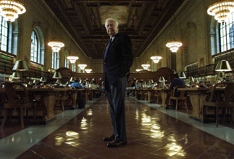File photo by Ruth Fremson of The New York Times / The biographer David McCullough at the main branch of the New York Public Library in Manhattan on May 22, 2001. McCullough, who was known to millions as an award-winning, best-selling author and an appealing television host and narrator, died on Aug. 7, 2022, at his home in Hingham, Mass. He was 89.