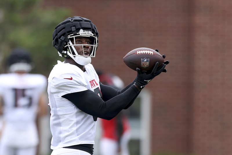 Atlanta Journal-Constitution photo by Jason Getz via AP / Atlanta Falcons tight end Kyle Pitts makes a catch at training camp on Aug. 1 in Flowery Branch, Ga.