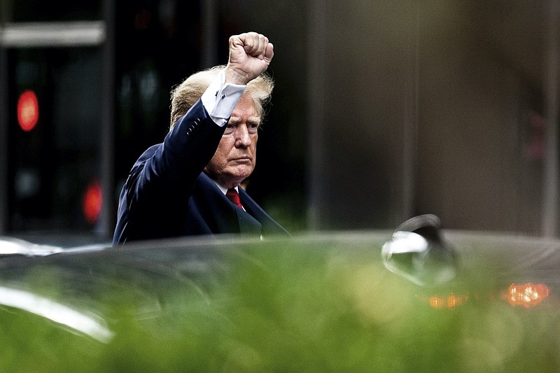 Former President Donald Trump gestures as he departs Trump Tower, Wednesday, Aug. 10, 2022, in New York, on his way to the New York attorney general's office for a deposition in a civil investigation. (AP Photo/Julia Nikhinson)