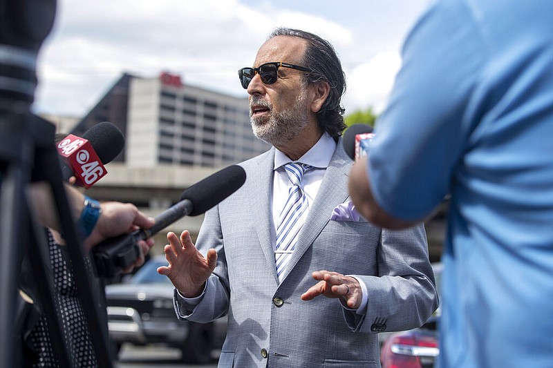 Attorney Drew Findling makes remarks regarding his client, Clayton County Sheriff Victor Hill, during a news conference outside of the Richard B. Russell Federal building in Atlanta on April 27, 2021. Findling's firm said in a statement Thursday, Aug. 11, 2022, that it is representing former President Donald Trump along with two other attorneys. Trump has hired the prominent Atlanta criminal defense attorney to represent him in matters related to the special grand jury that is investigating whether the former president illegally tried to interfere with the 2020 election in Georgia. (Alyssa Pointer/Atlanta Journal-Constitution via AP, File)