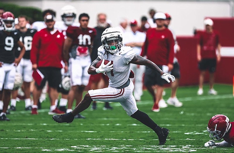 Crimson Tide photos / Former Dalton High and Georgia Tech running back Jahmyr Gibbs looks for running room during Alabama's first preseason scrimmage Saturday afternoon.