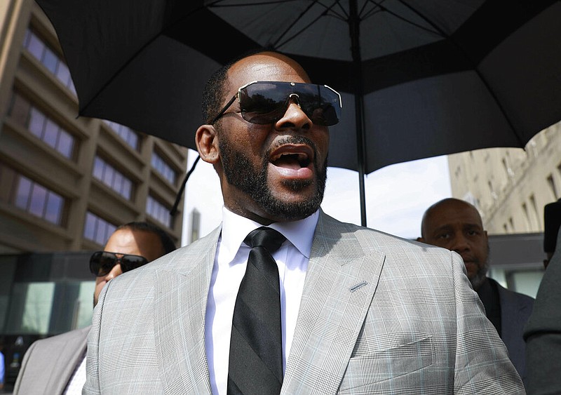 Musician R. Kelly leaves the Leighton Criminal Court building in Chicago on June 6, 2019. Kelly's federal trial starts Monday in Chicago. (AP Photo/Amr Alfiky, File)