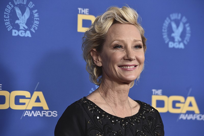 Anne Heche arrives at the 74th annual Directors Guild of America Awards on March 12, 2022, in Beverly Hills, Calif. Heche, who first came to prominence on the NBC soap opera "Another World" in the late 1980s before becoming one of the hottest stars in Hollywood in the late 1990s, died Sunday, Aug. 14, 2022, nine days after she was injured in a fiery car crash. She was 53. (Photo by Jordan Strauss/Invision/AP, File)