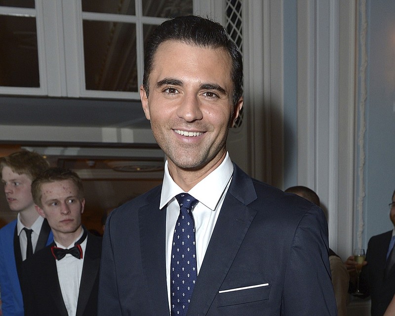 Darius Campbell Danesh appears at the after party for the opening night of the "Dirty Rotten Scoundrels" musical in the Savoy Hotel in London on April 2, 2014. Campbell Danesh, who shot to fame in 2001 on the British reality-talent show "Pop Idol" and topped British music charts the following year with his single "Colourblind," has died at age 41. (Photo by Jon Furniss/Invision/AP, File)