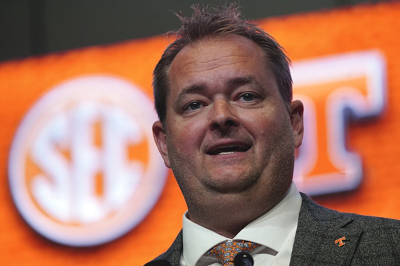 Tennessee head coach Josh Heupel speaks during NCAA college football Southeastern Conference Media Days on July 21, 2022, in Atlanta. Heupel is trying to rebuild a program dealing with an NCAA investigation that alleges 18 major rules violations involving recruiting issues. (AP Photo/John Bazemore, File)