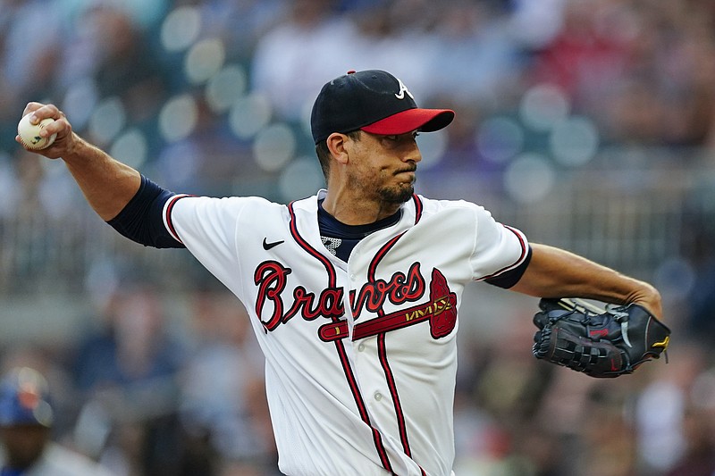 Atlanta Braves starting pitcher Charlie Morton (50) works against the New York Mets in the first inning of a baseball game Tuesday, Aug. 16, 2022 in Atlanta. (AP Photo/John Bazemore)